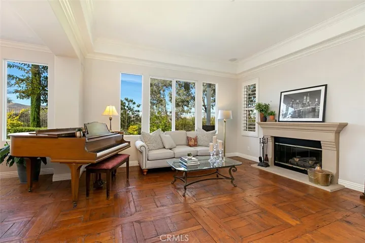 Hand scraped 100 year old barn siding flooring in your living room with an amazing hillside VIEW