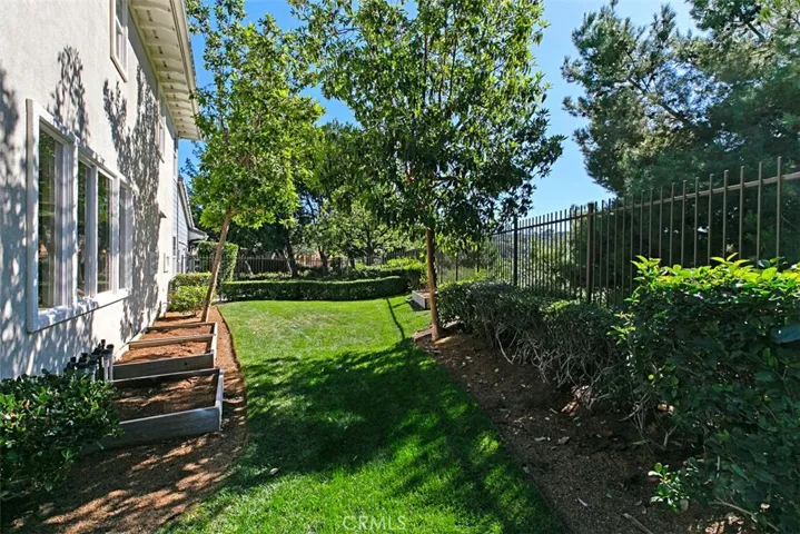 Plenty of room in your side yard for games and/or vegetable gardening