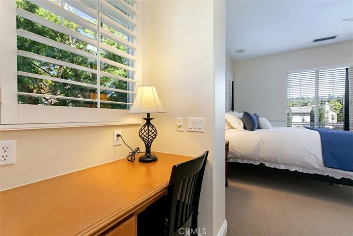 Even a built-in desk leading into the bedroom