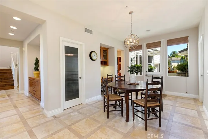 Are you noticing the amazing Parquet Travertine Flooring?  An upgraded builder option.