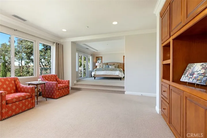 Enjoy your private retreat with more built-in shelving, expansive windows and slider to the view deck