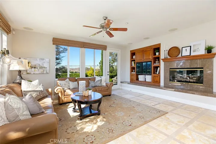 Raised Hearth, Granite Gas Fireplace and Built-In Entertainment center