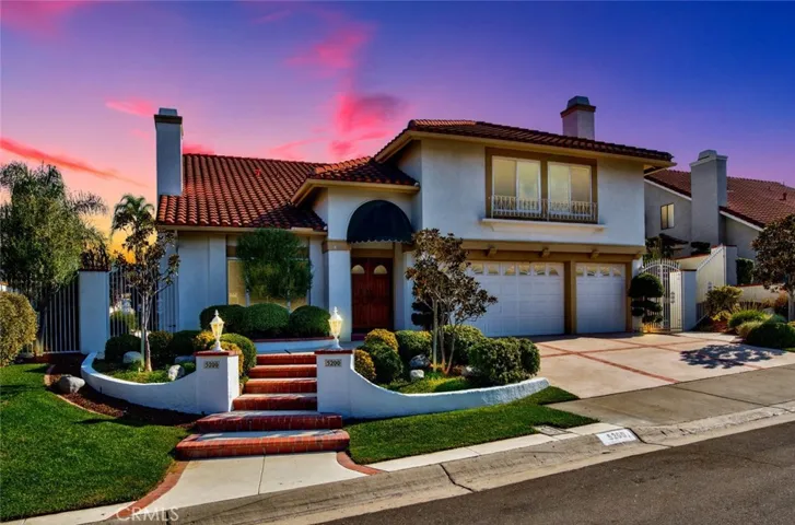 The view from the street of this wonderful East Lake Village home, just minutes from the lake.