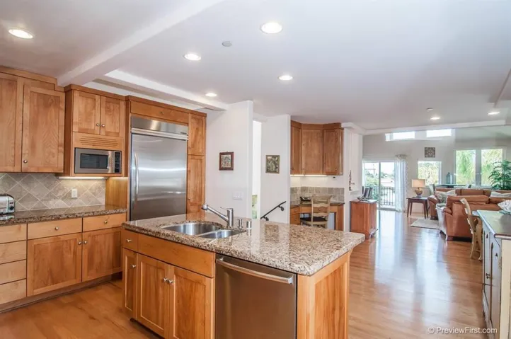 The kitchen has a nice granite island which opens to the great room and is perfect for entertaining!