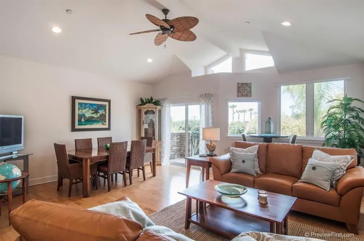 The dining room of your custom home has vaulted ceilings and wonderful light throughout.