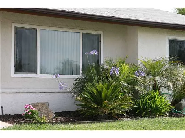 Lots of love in the meticulous details. Beautiful border plants to welcome you home!