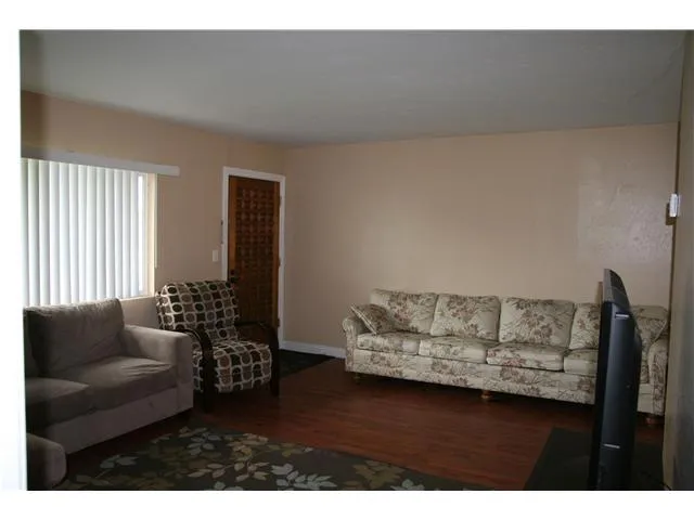 Great open floor plan, natural light and beautiful wood laminate flooring.