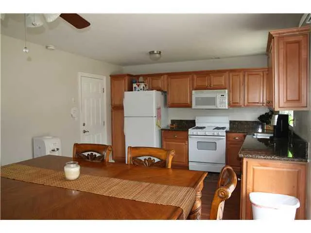 Upgraded kitchen, loads of counter space, gas stove, built in microwave