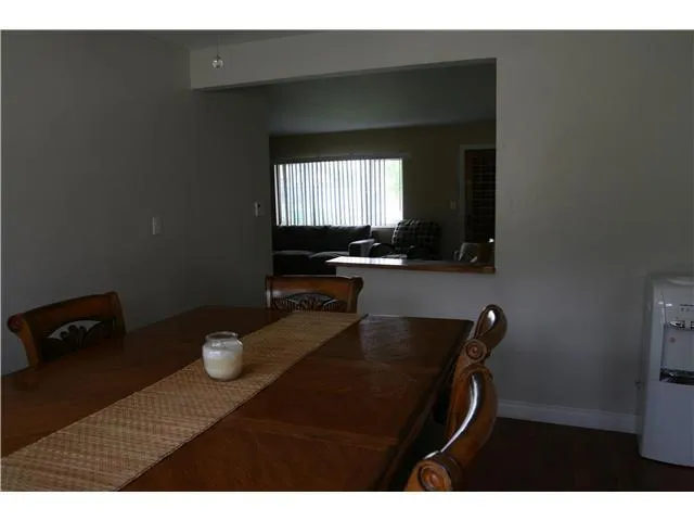 Natural transition from dining to living room.
