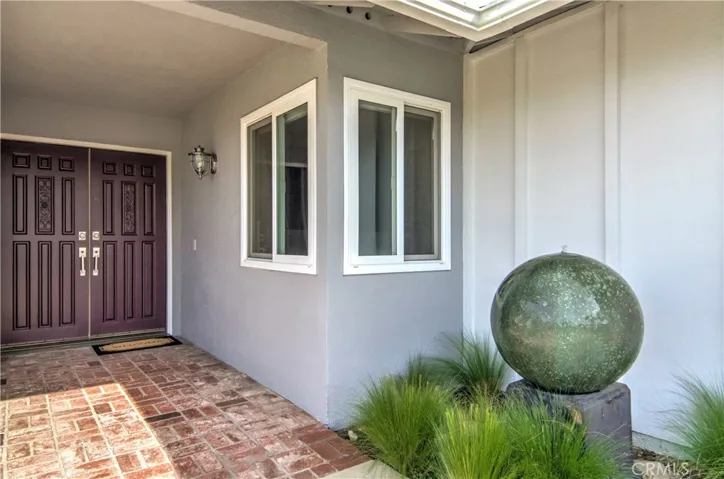 Now...let's take the tour starting with this inviting, covered front porch and double door entry...