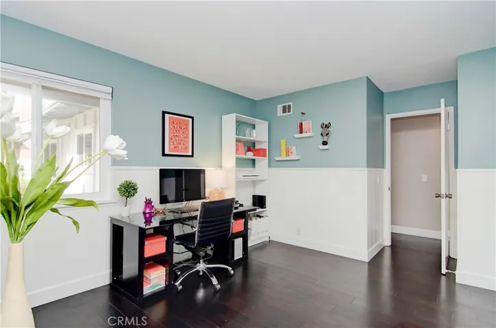 Another roomy bedroom that makes a super home office too...