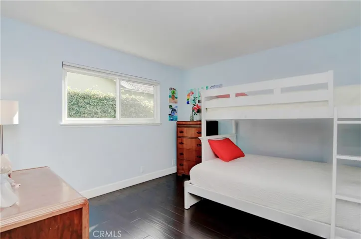 Roomy kids room has plenty of room for study, play and friends...