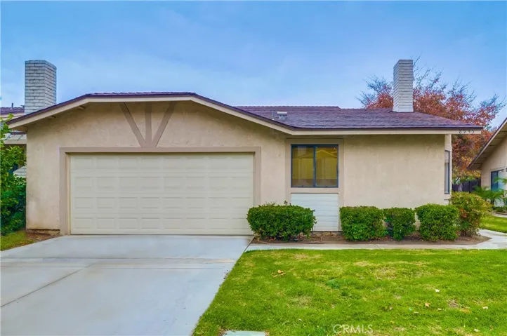 Lovely home in a gated community with a 2 car attached garage