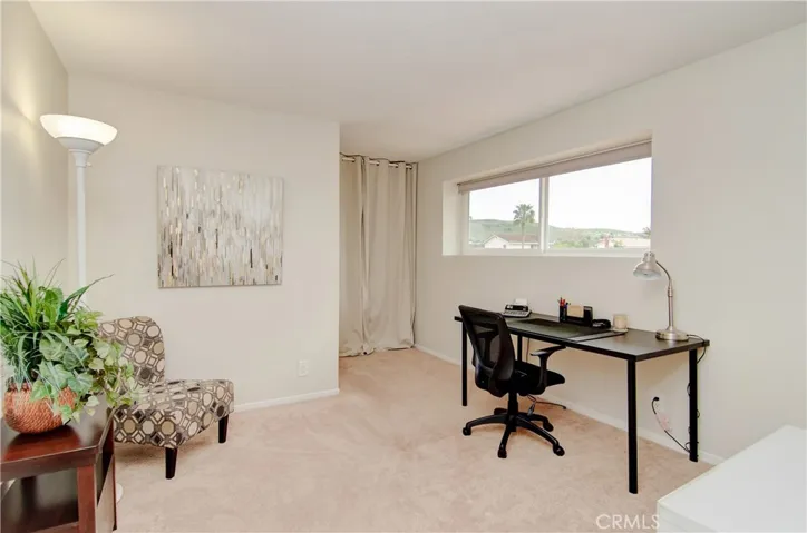 Fourth bedroom being used for large home office.