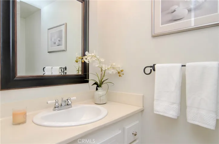 Convenient downstairs powder room.
