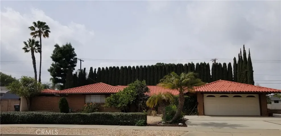 Front view of 1850 N Stoneridge. The property of 2,775 sqft sits on a 15,400 sqft corner lot.