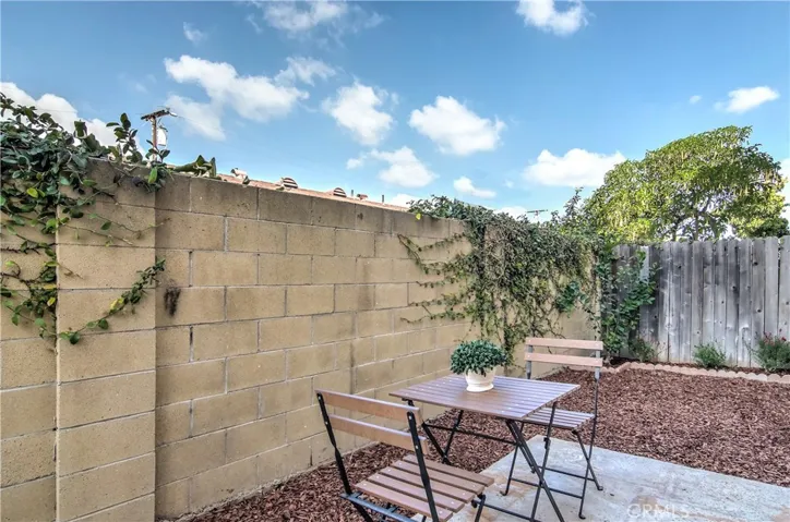 Sunny and private rear yard is a relaxing place to enjoy the outdoors...room for gardening too.