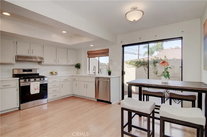 Wow is right...amazing kitchen and dining area with slider to private yard.