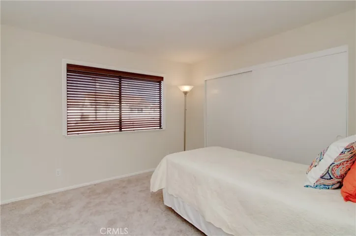 Additional bedroom has large wardrobe closet.