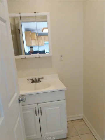 Convnenient HALF BATH IS  right of the kitchen.