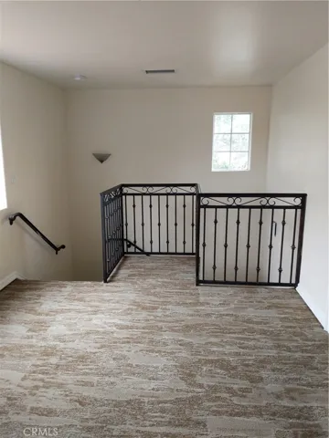 Note the BRAND NEW CARPET that graces the entire uipper floor. This loft is the perfect kid's study/play area....or HOME OFFICE space!