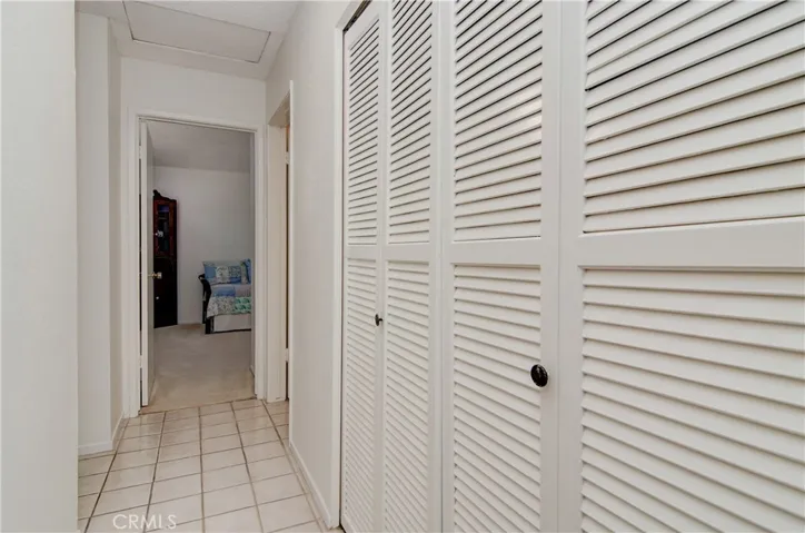 Excellent floor plan has nice separation between the bedrooms, plus convenient laundry area in hallway accommodates full size washer and dryer.