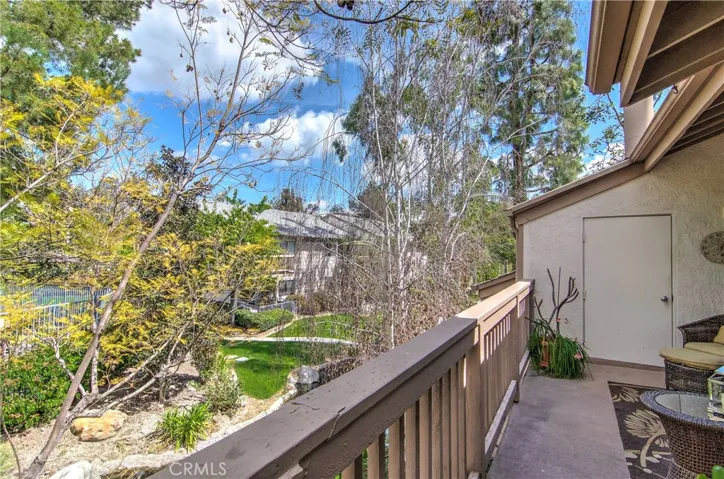 This super private balcony is a wonderful place to relax and soak up the sun and nature...love the treetop, stream and greenbelt views!
