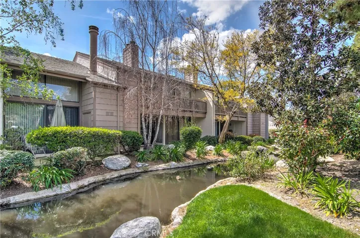 Private balcony offers peaceful stream and tree top views.