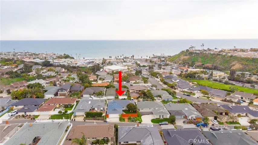 The home under the red arrow is your new home!