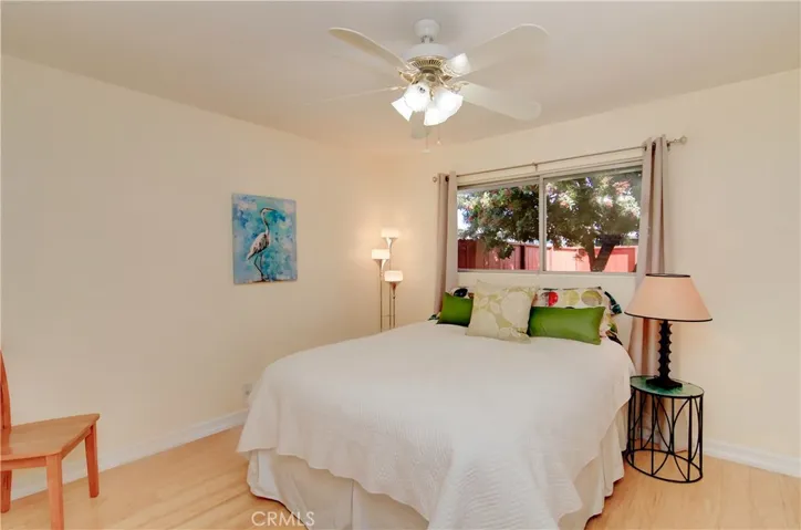 2nd and 3rd bedrooms are similar size with bamboo flooring and ceiling fans.