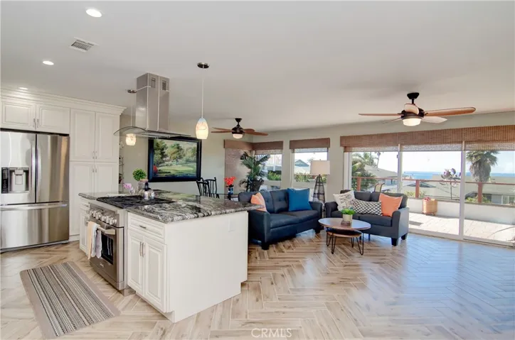 Who wouldn't want to cook at the stovetop while overlooking an ocean view?