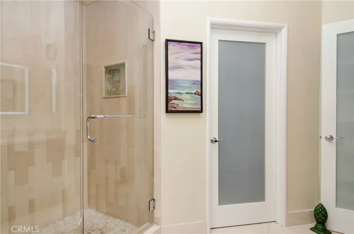 Stylish details in master bath, plus walk-in closet with organizers and separate linen space...plus plus plus another huge walk-in closet in the bedroom.