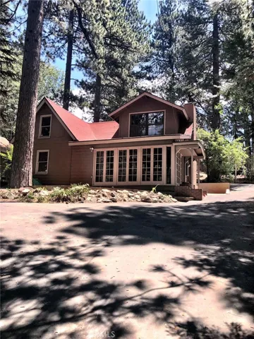 EXTERIOR FRONT SHOWING LOTS OF PARKING
