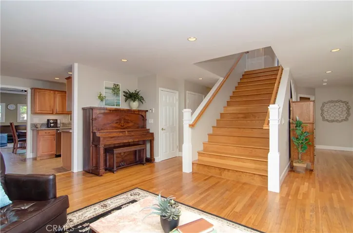 This home has awesome transition spaces, including extra wide hallways and passages between rooms, and of course this amazing hardwood staircase.
