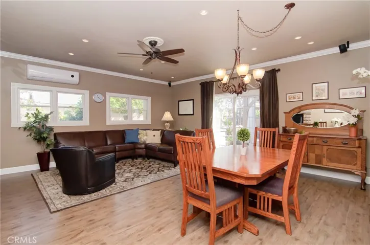Now this is a GREAT room....plenty of space for family, entertaining and dining...plus slider to outdoors makes for easy transition inside and out.