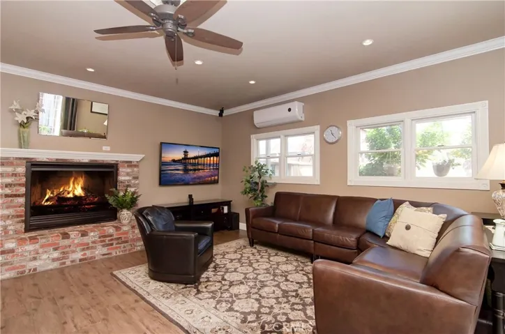 Fantastic great room has it all...fireplace, media space, dining space...perfect for family and entertaining.