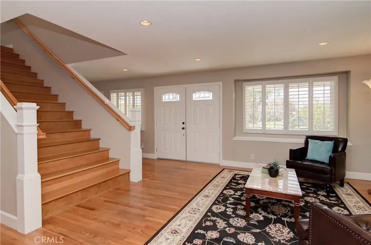 Classic, double door entry opens to a grand staircase that sets the stage for this traditional yet modern home.