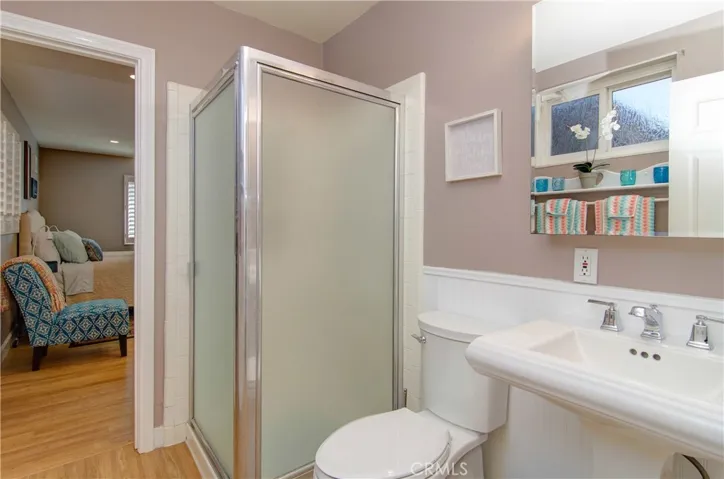 Downstairs suite bath with nice traditional details and fixtures.