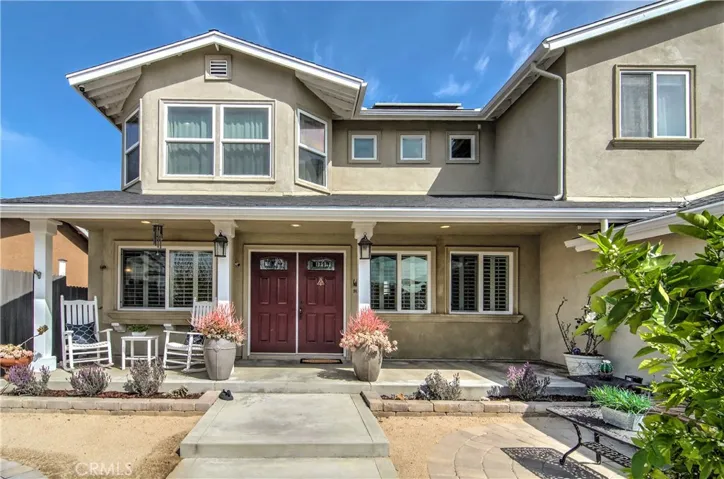This front porch is the perfect spot to sit and watch the world go by...whether starting or finishing the day...