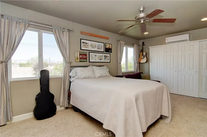 Another huge secondary upstairs bedroom with huge wardrobe closet...kids will be in heaven here with all the space!