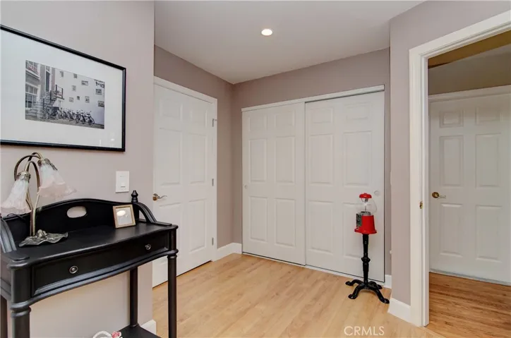 Downstairs suite sitting room with two wardrobe closets and bedroom #5 entrance...it has large wardrobe closet too!