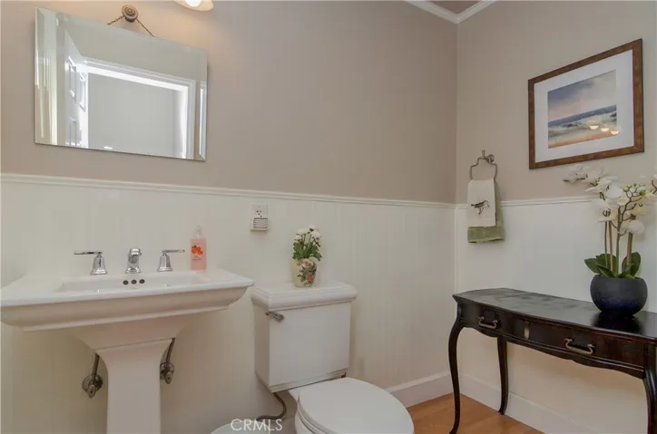 Beautiful downstairs powder room features such nice details....and is roomy too.