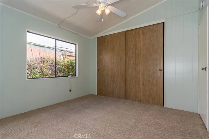 Guest bedroom with a ceiling fan for those warm summer nights