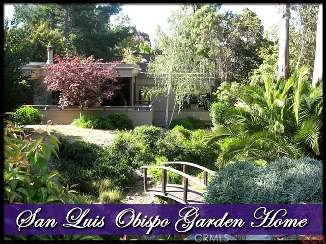 Beautiful Garden VIEW Home on large lot with running winter creek! Surround yourself with nature inside and out.