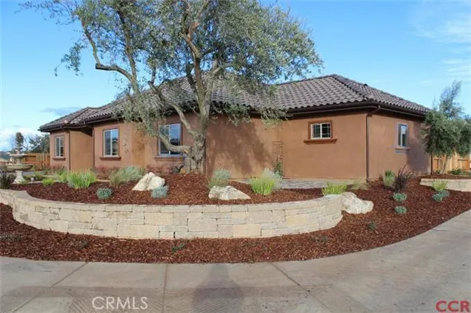 View from corner of Adriana & Montebello Oaks, beautifully landscaped with olive trees
