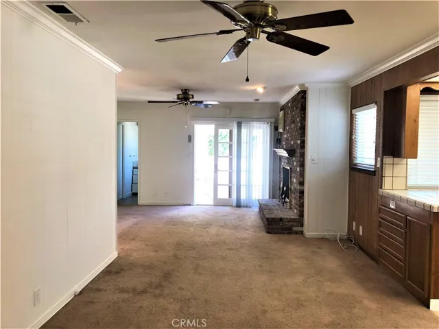 Family room with brick fireplace