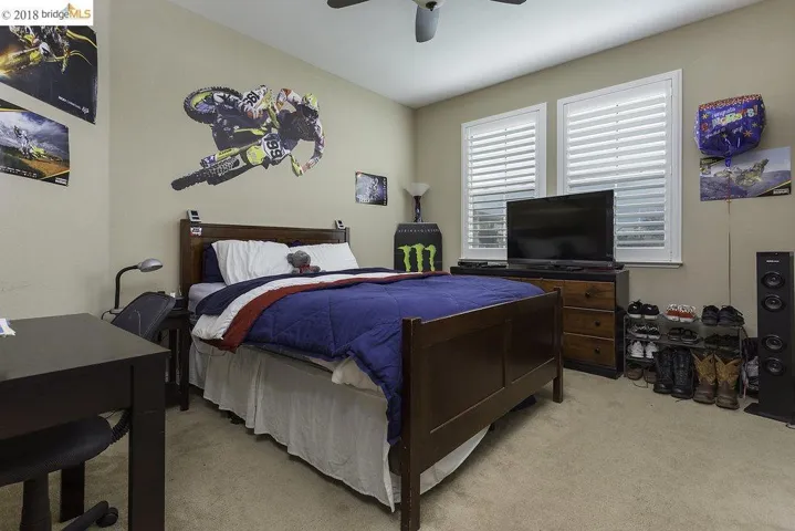 Spacious Bedroom w/Plush Carpeting & Plantation Shutters