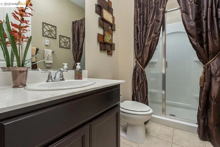 Cultured Marble Counter-tops, Tile Flooring.