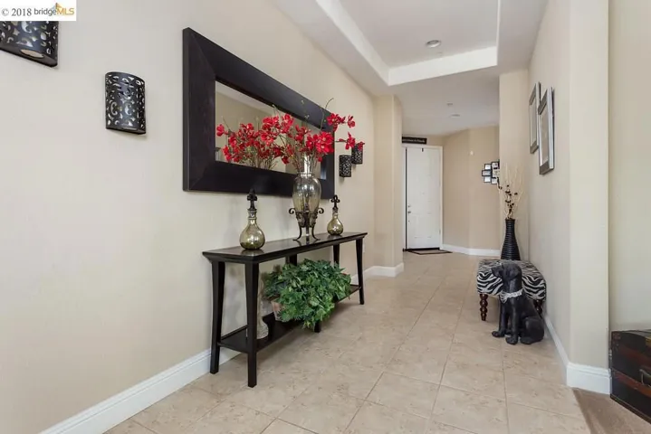 Tile Flooring. Fully Painted and Larger Baseboards throughout home.