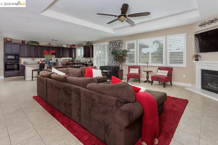 Decorative Ceiling Fan, Plantation Shutters, Tile Flooring, Gas Fire Place, plenty of room!